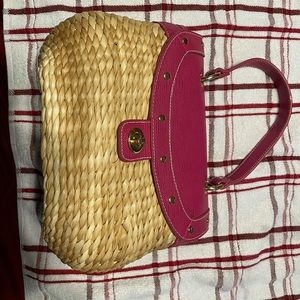 Small pink straw purse
